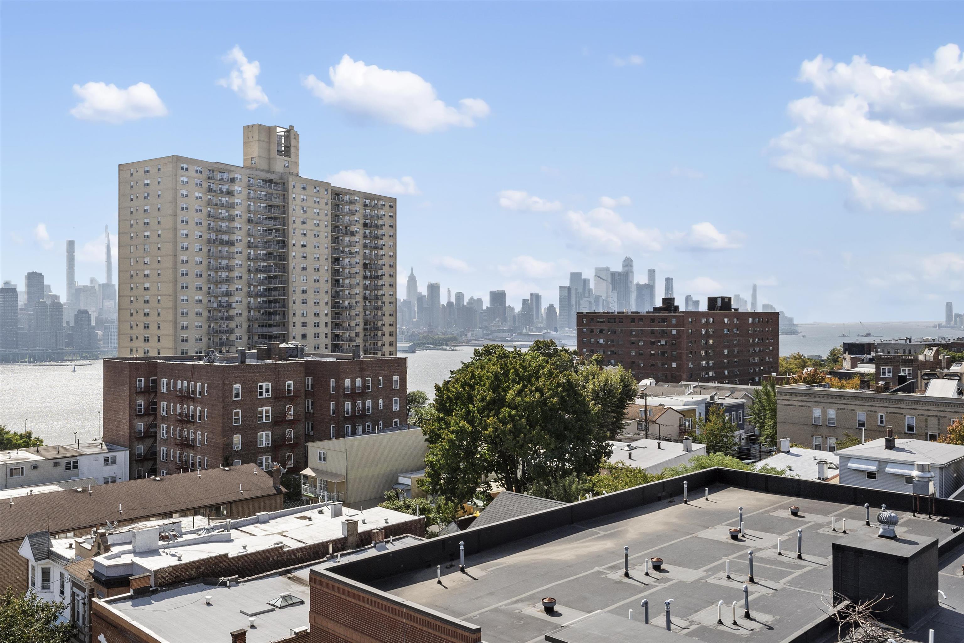 60-64 68th Street, Unit 208 Guttenberg, NJ 07093 - Photo 27 of 29 a view of a city