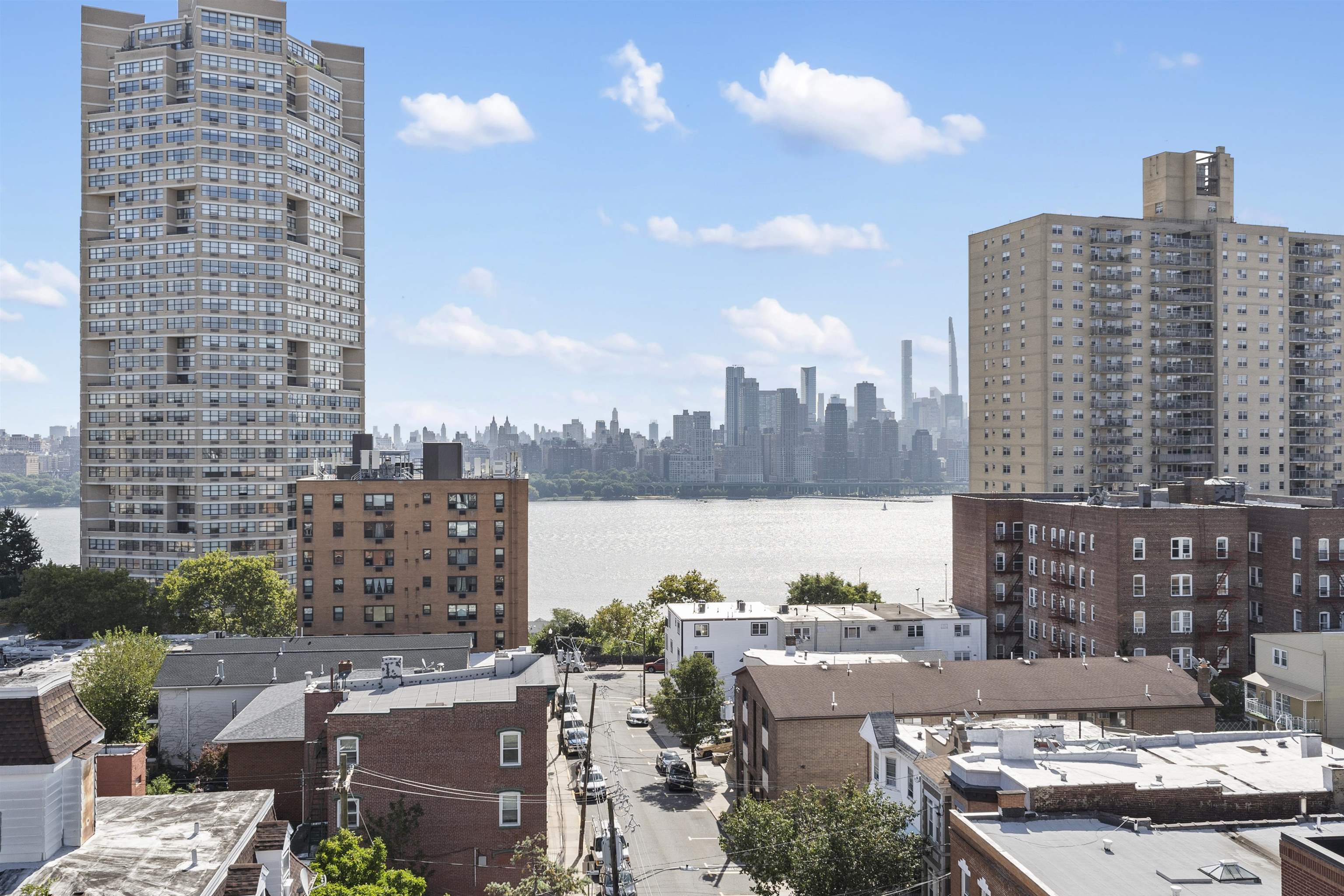 60-64 68th Street, Unit 208 Guttenberg, NJ 07093 - Photo 28 of 29 a view of a city