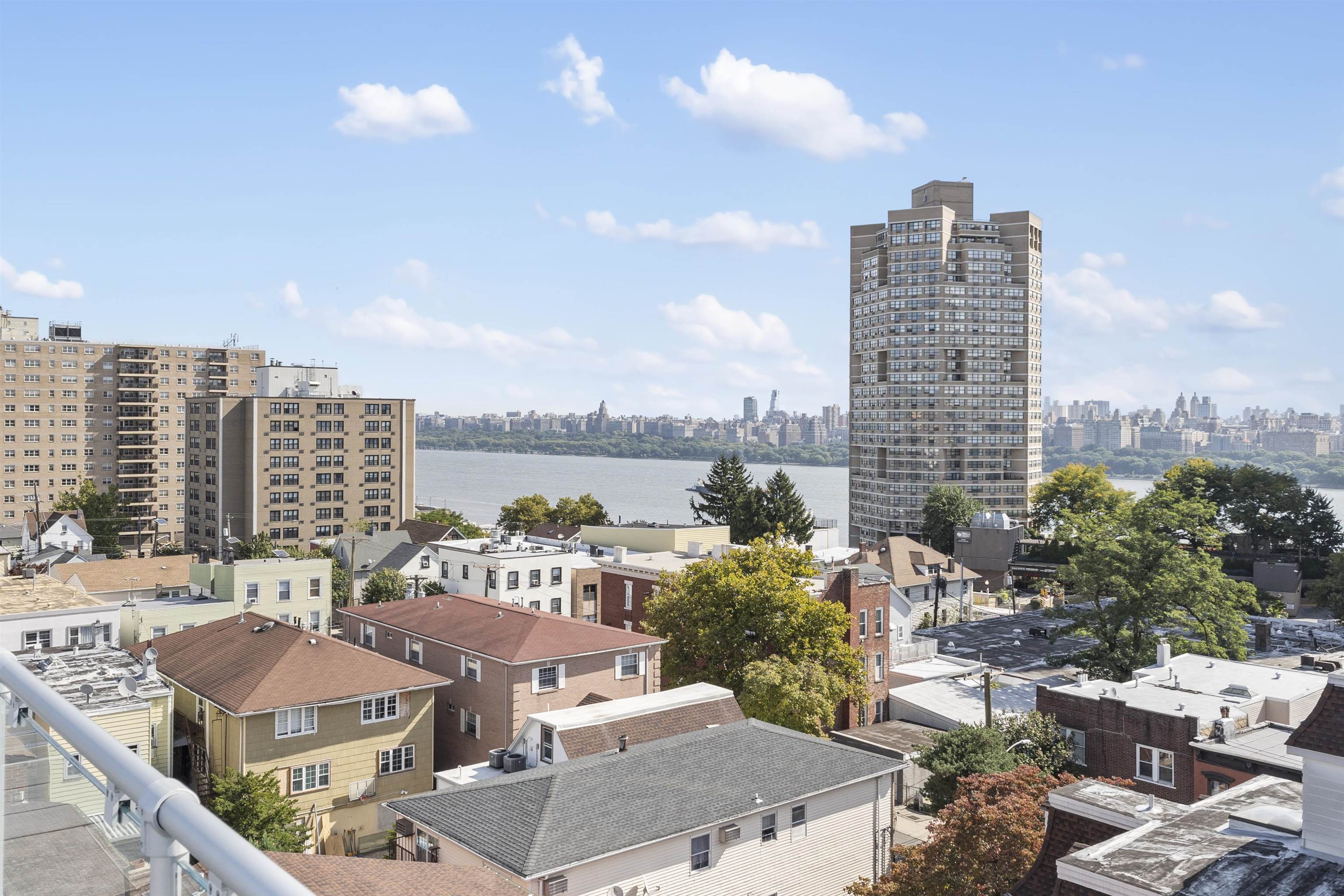 60-64 68th Street, Unit 208 Guttenberg, NJ 07093 - Photo 29 of 29 a view of a city with tall buildings