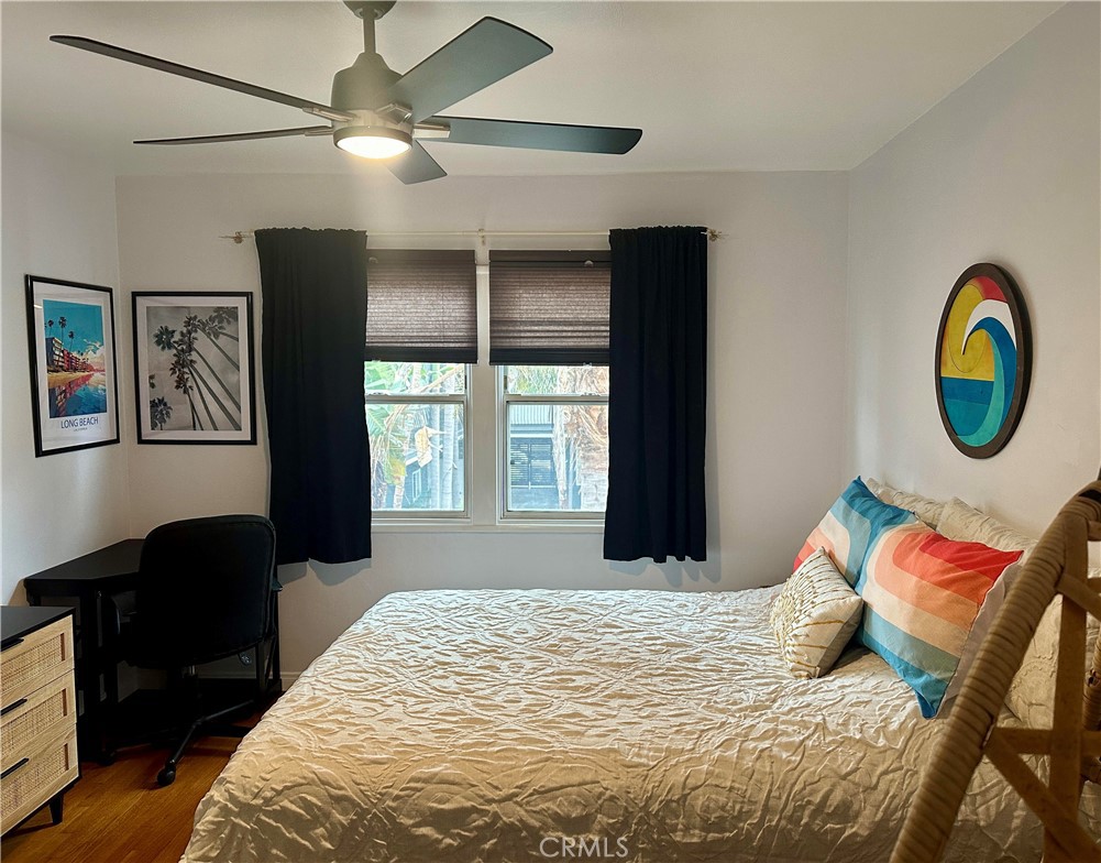 219 Esperanza Avenue, Unit 7 Long Beach, CA 90802 - Photo 11 of 13 a bedroom with a bed and a window