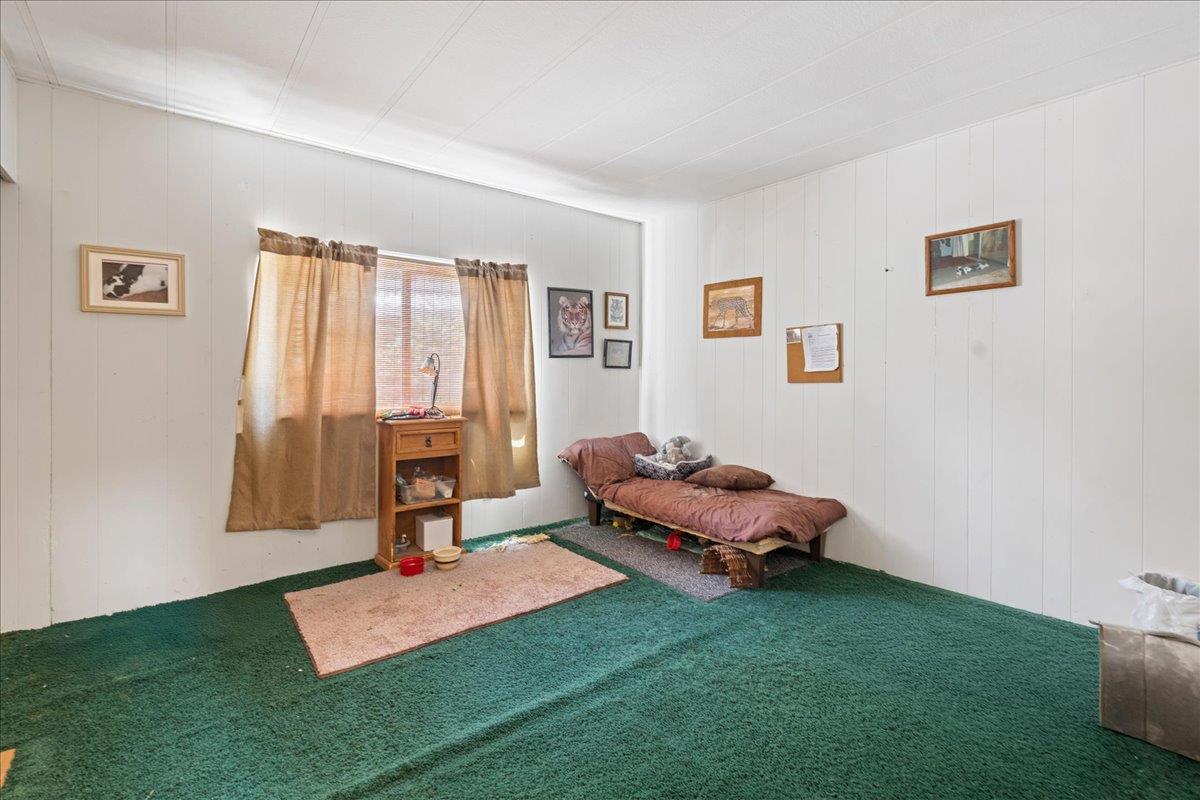 4420 Pleasant Valley Road, Unit 131 Diamond Springs, CA 95619 - Photo 17 of 30 a living room with furniture and a window