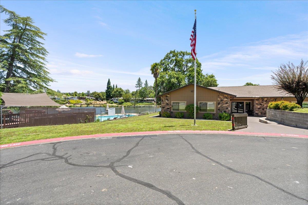4420 Pleasant Valley Road, Unit 131 Diamond Springs, CA 95619 - Photo 25 of 30 a view of a swimming pool and a yard