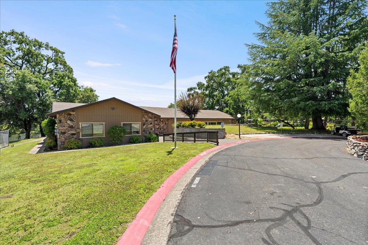 4420 Pleasant Valley Road, Unit 131 Diamond Springs, CA 95619 - Photo 26 of 30 a view of a house with backyard and a tree