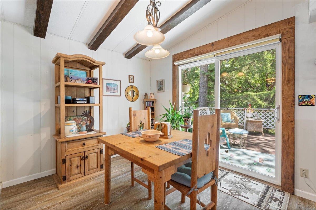 4420 Pleasant Valley Road, Unit 131 Diamond Springs, CA 95619 - Photo 5 of 30 a view of a dining room with furniture large window and wooden floor