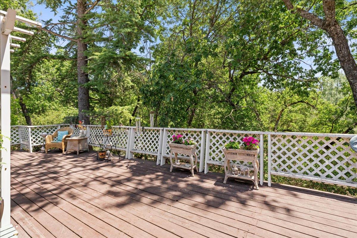 4420 Pleasant Valley Road, Unit 131 Diamond Springs, CA 95619 - Photo 9 of 30 a view of a wooden deck and a patio