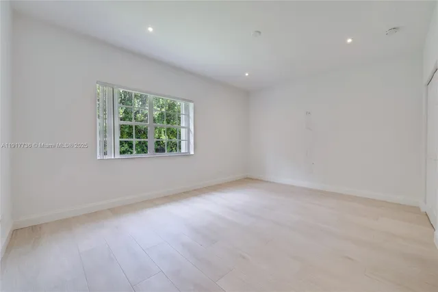 an empty room with a window