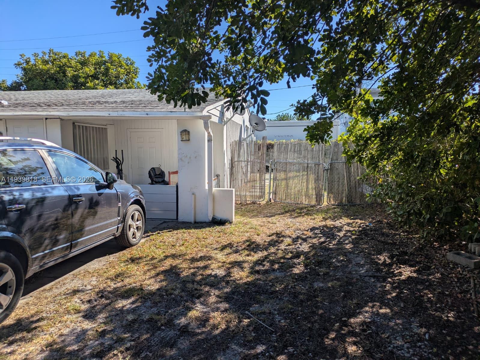 2116 Monroe Terrace Hollywood, FL 33020 - Photo 30 of 40 a front view of a house with a yard