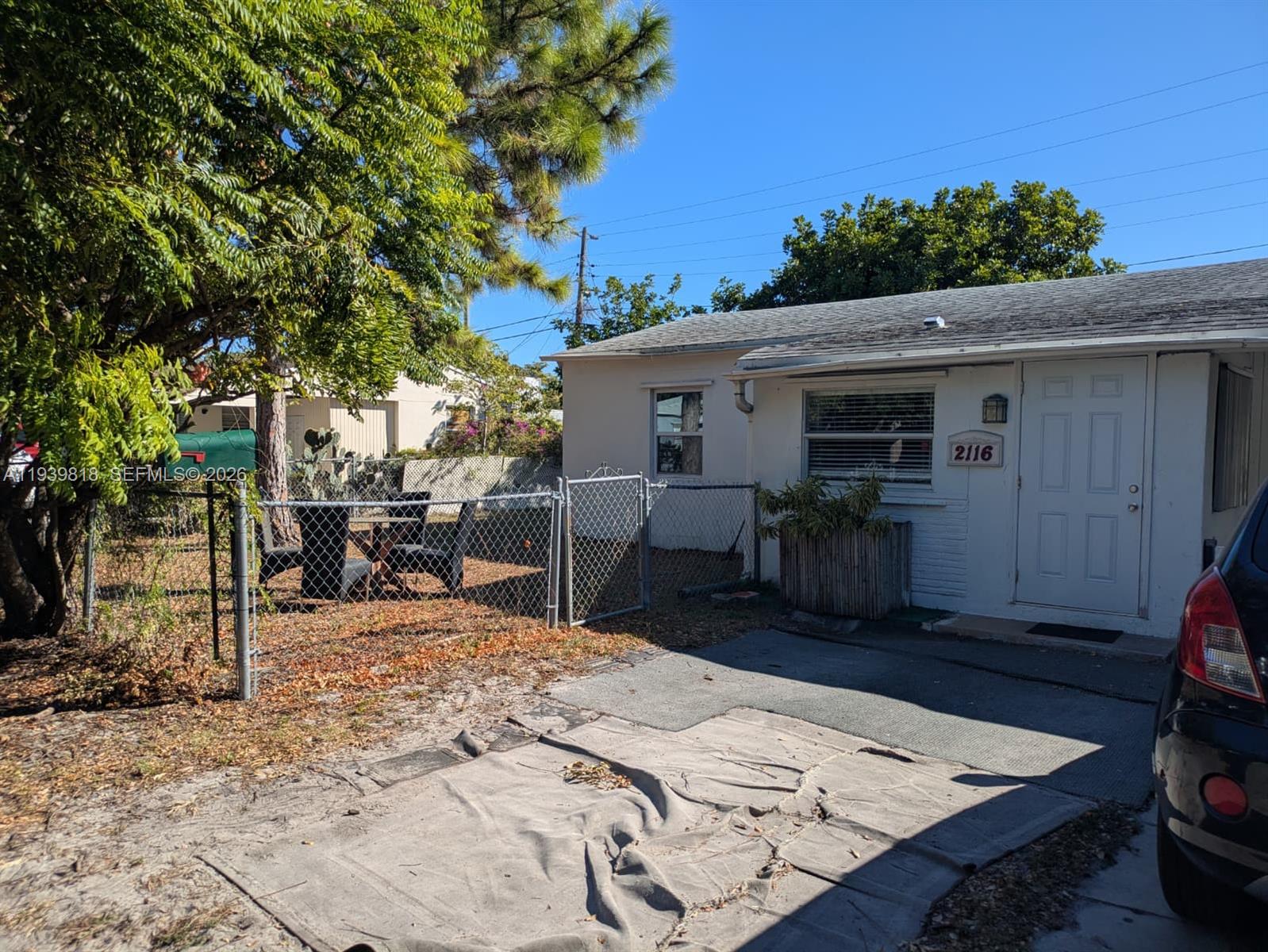 2116 Monroe Terrace Hollywood, FL 33020 - Photo 31 of 40 a view of a dinning table and chair in the patio