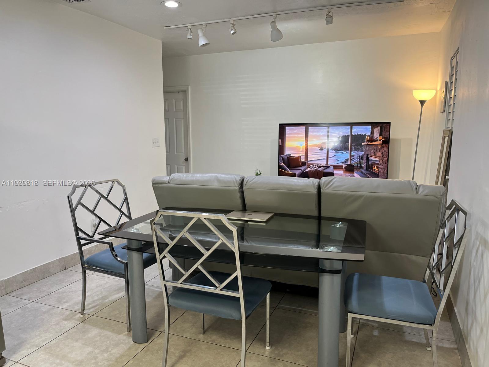2116 Monroe Terrace Hollywood, FL 33020 - Photo 38 of 40 a view of a dining room with furniture