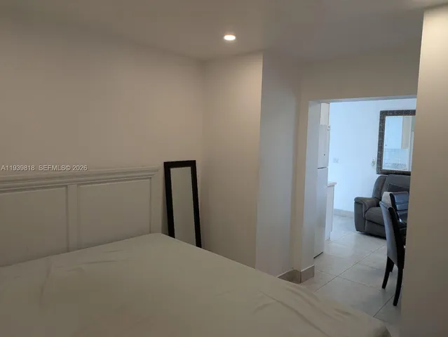 a bedroom with a bed