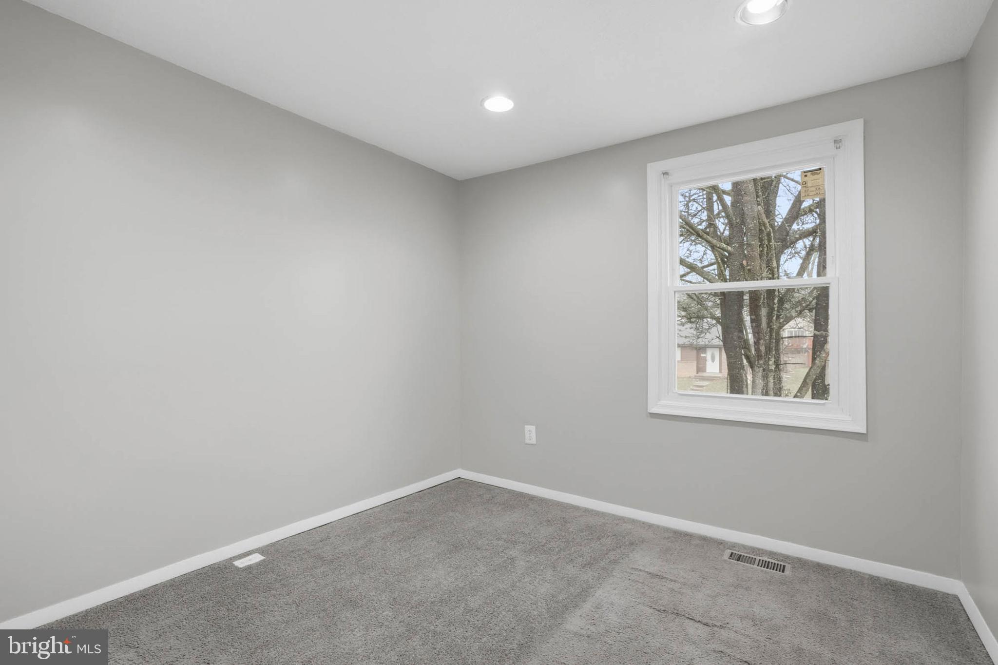 9931 Tuscarora Road Randallstown, MD 21133 - Photo 16 of 30 an empty room with windows