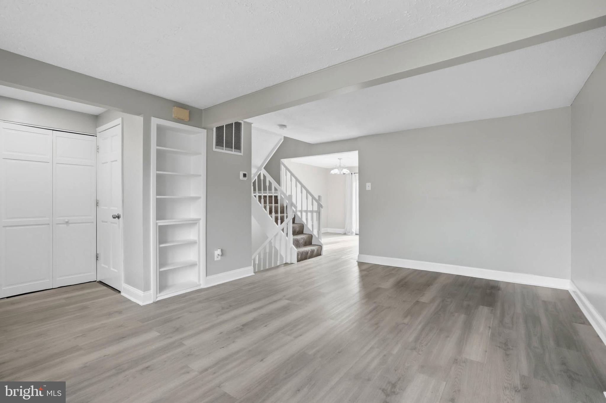 9931 Tuscarora Road Randallstown, MD 21133 - Photo 3 of 30 a view of empty room with wooden floor
