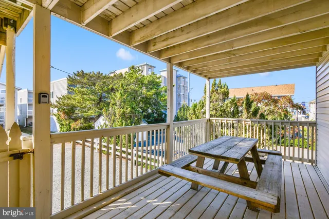 a view of a two chairs on the roof deck
