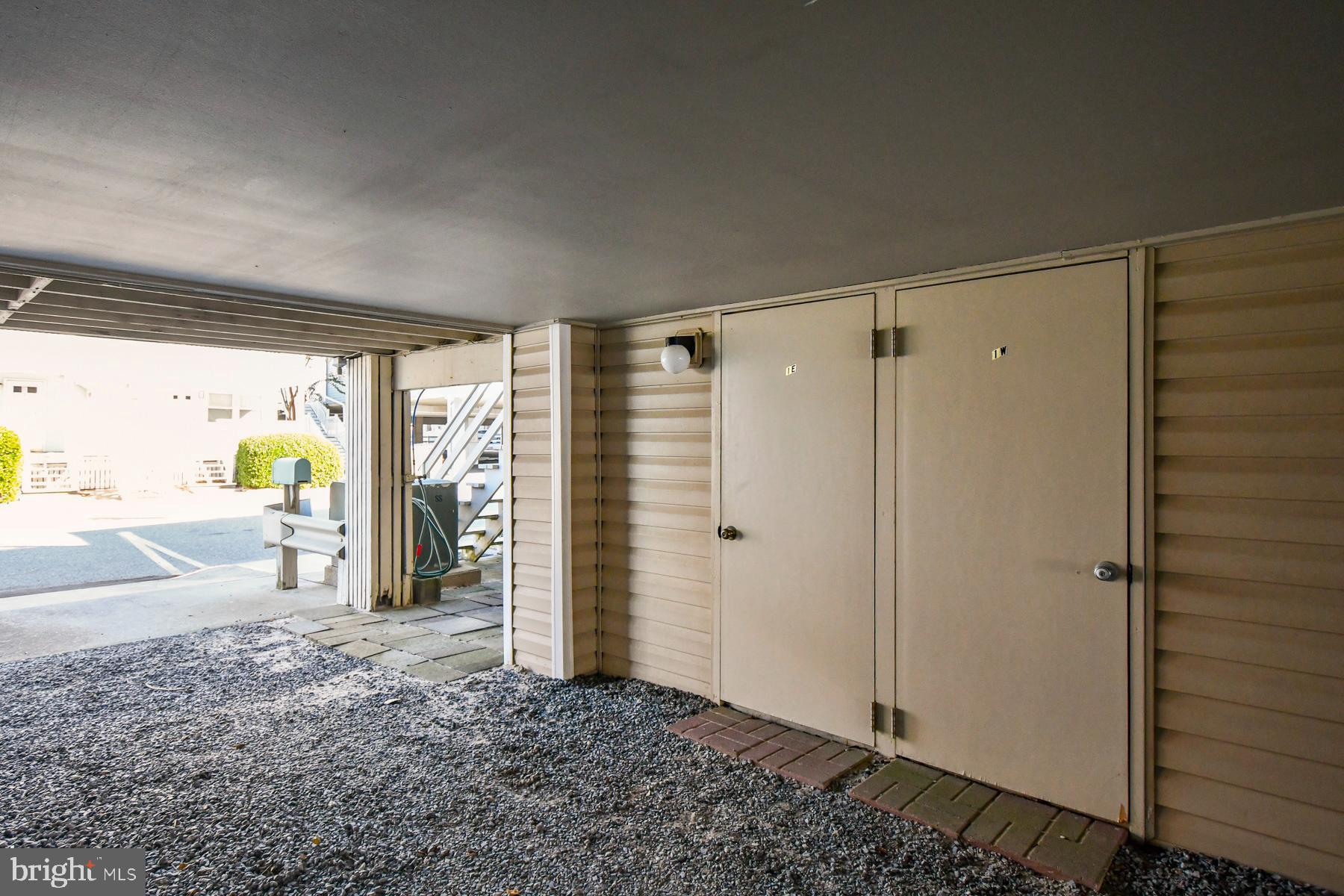13 75th Street, Unit 1W Ocean City, MD 21842 - Photo 19 of 26 a view of entryway with wooden floor and door
