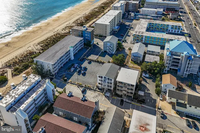 an aerial view of a building with outdoor space