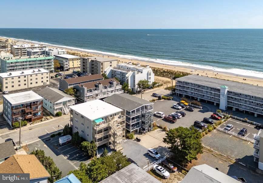 13 75th Street, Unit 1W Ocean City, MD 21842 - Photo 24 of 26 a picture of city view with lawn chairs
