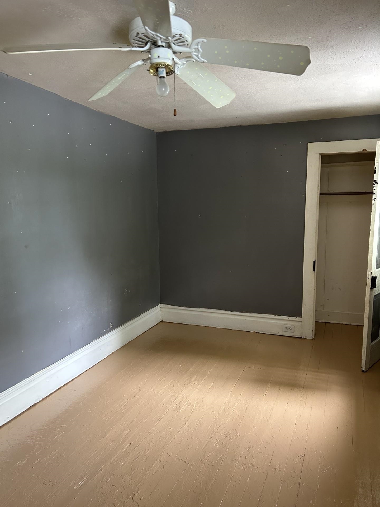 29 Tye River Turnpike Raphine, VA 24472 - Photo 11 of 17 an empty room with a ceiling fan and a window