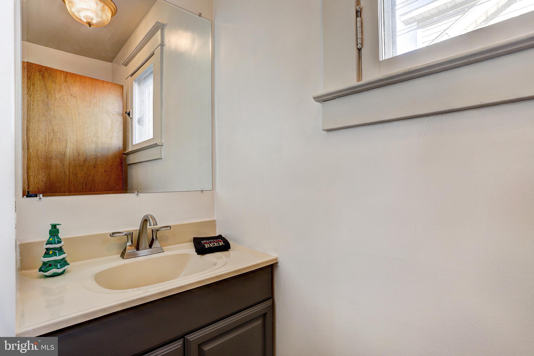 7416 Old Harford Road Baltimore, MD 21234 - Photo 18 of 35 First floor powder room off kitchen
