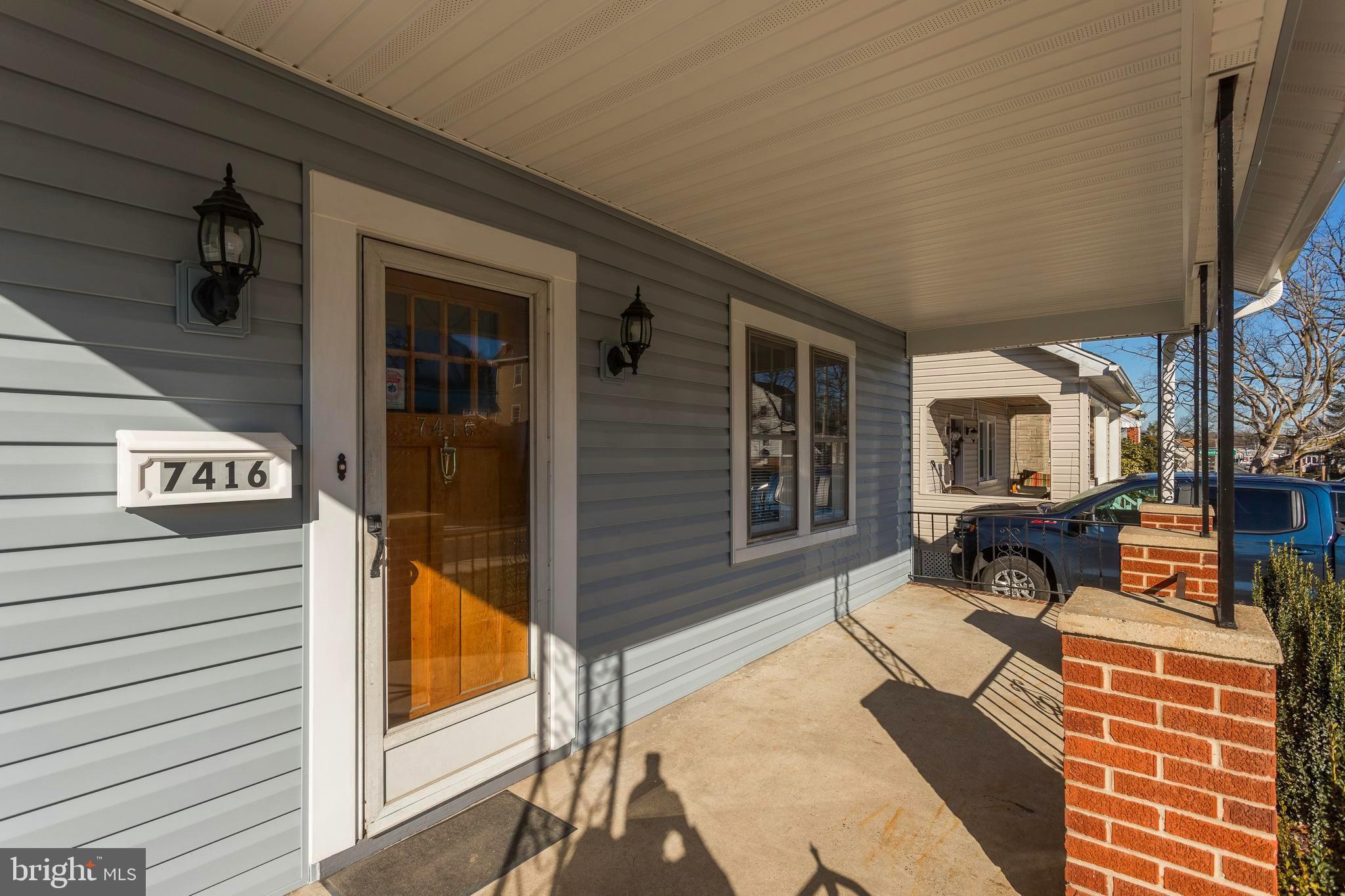 7416 Old Harford Road Baltimore, MD 21234 - Photo 3 of 35 Sit back and relax on your 22 X 7 front porch