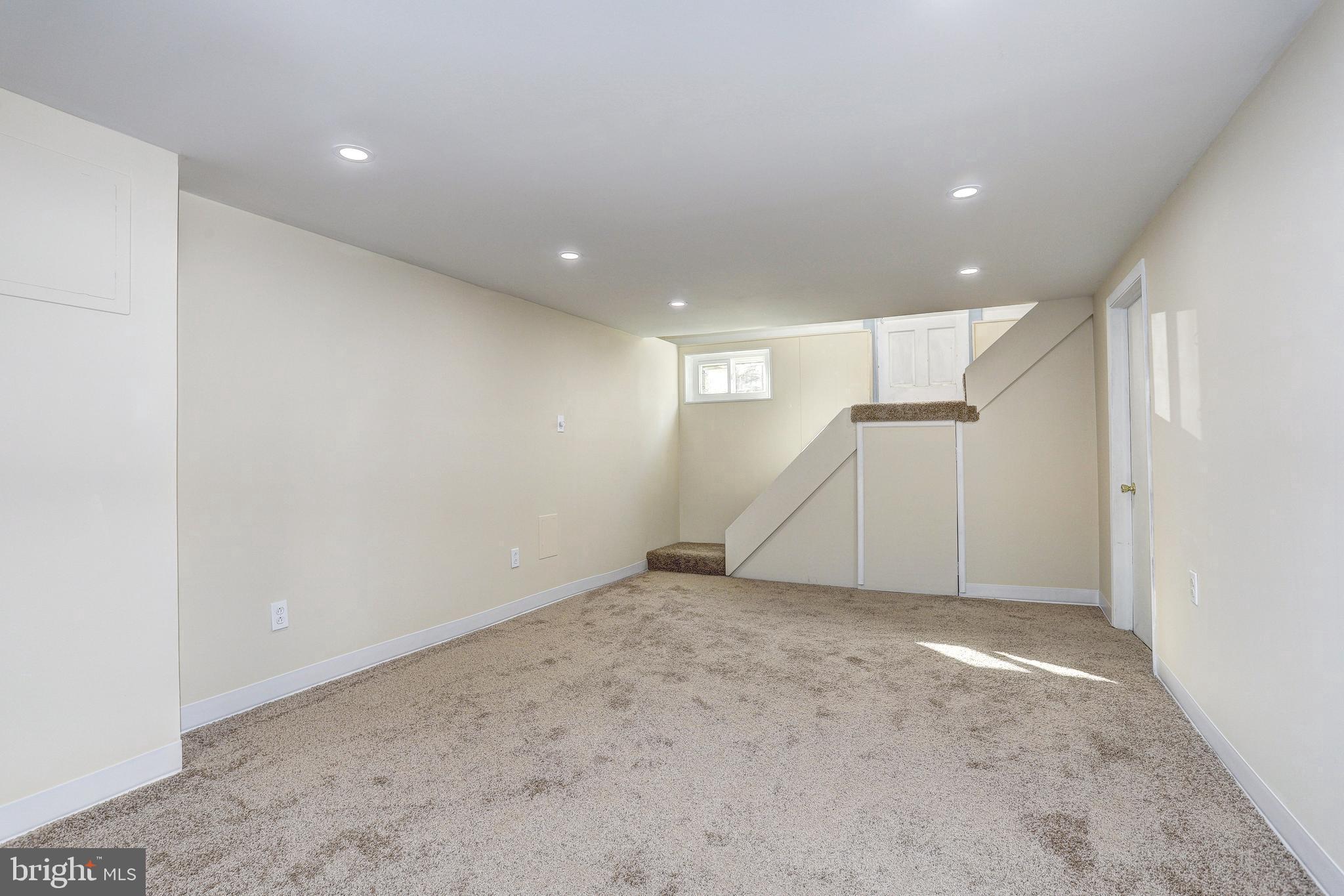 7416 Old Harford Road Baltimore, MD 21234 - Photo 26 of 35 lower level rec room w/side outside entrance