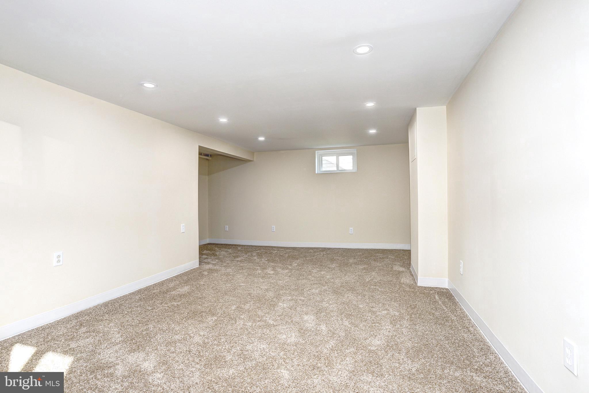 7416 Old Harford Road Baltimore, MD 21234 - Photo 27 of 35 New carpet and recessed lights in rec room