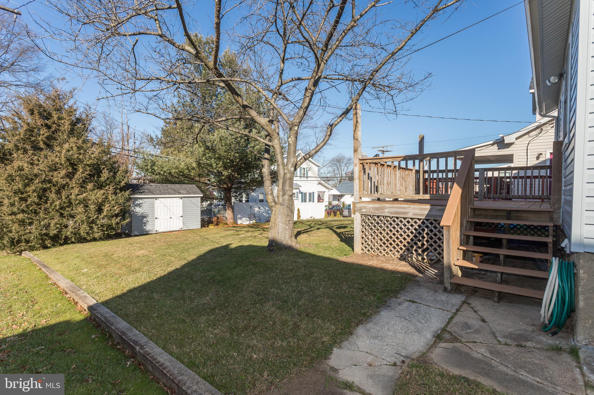 7416 Old Harford Road Baltimore, MD 21234 - Photo 28 of 35 rear yard w/steps leading to the deck