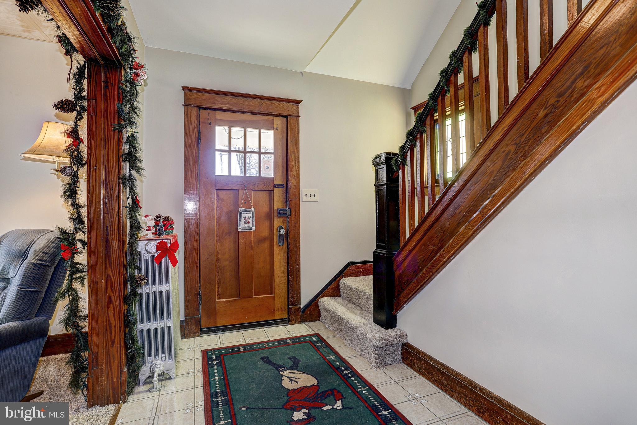 7416 Old Harford Road Baltimore, MD 21234 - Photo 4 of 35 Foyer with natural stained woodwork thru-out