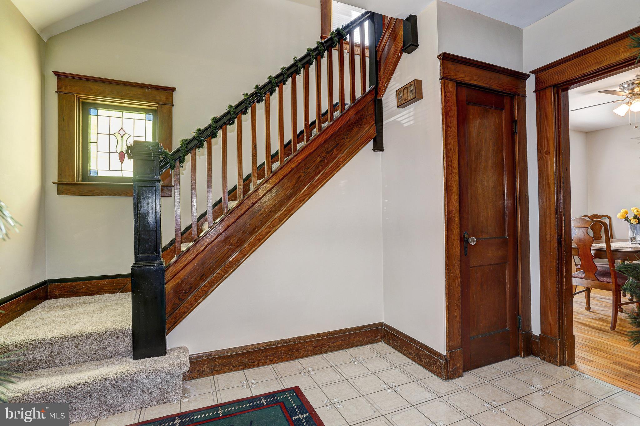 7416 Old Harford Road Baltimore, MD 21234 - Photo 5 of 35 Pretty wooded stair case and stain glass window