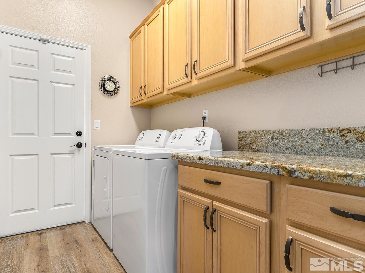 9684 Rolling Rock Way Reno, NV 89521 - Photo 28 of 34 a utility room with dryer and washer