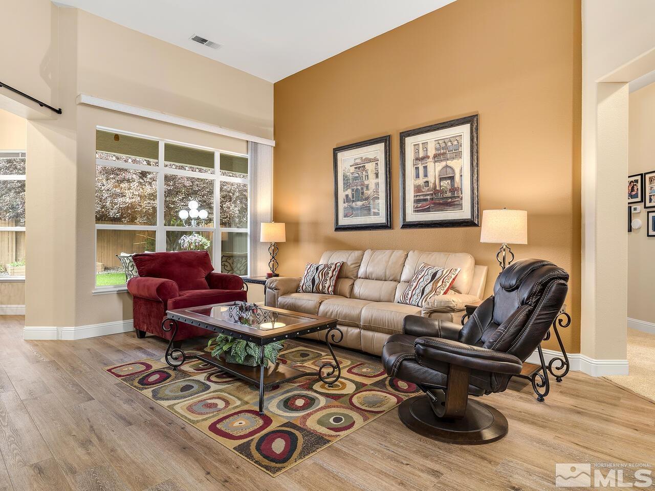 9684 Rolling Rock Way Reno, NV 89521 - Photo 3 of 34 a living room with furniture and a window