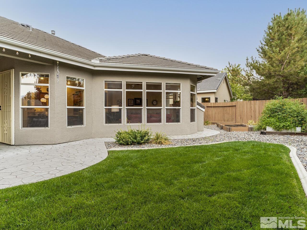 9684 Rolling Rock Way Reno, NV 89521 - Photo 33 of 34 a house view with a garden space