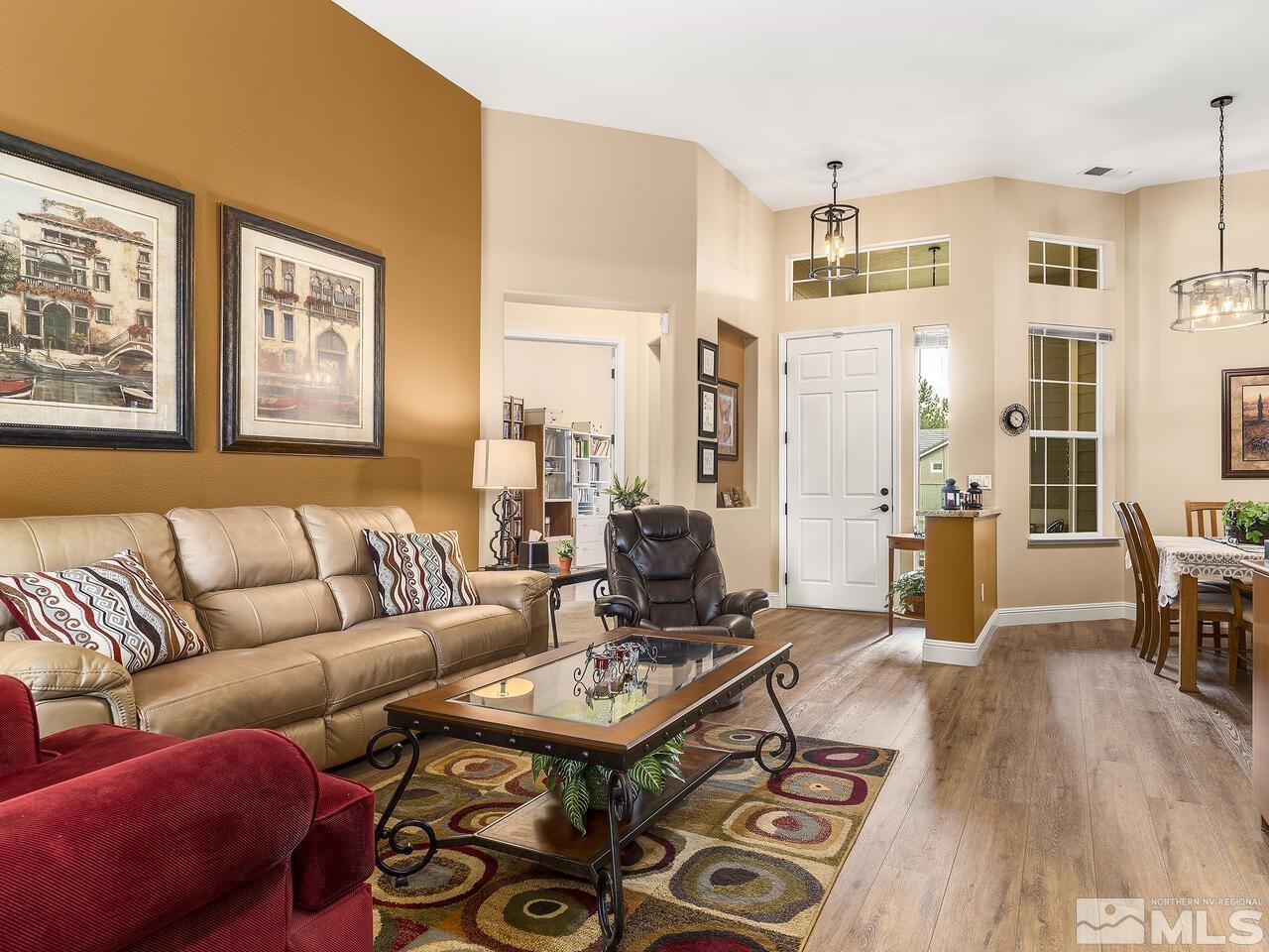 9684 Rolling Rock Way Reno, NV 89521 - Photo 4 of 34 a living room with furniture and wooden floor