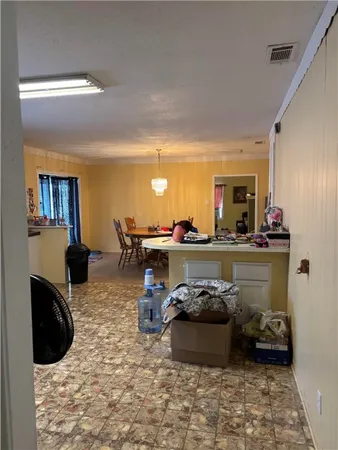 a room with furniture and a fireplace