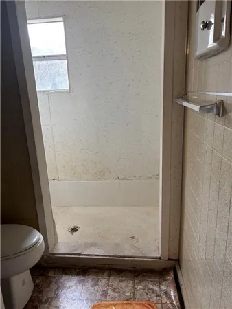 a bathroom with a toilet