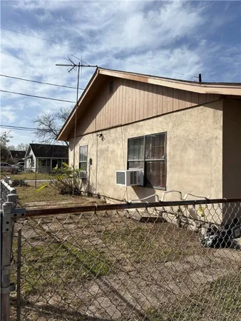 a front view of a house with street