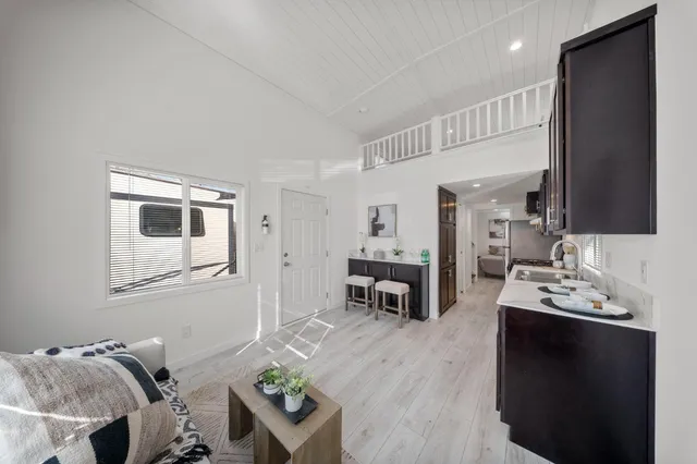 a living room with furniture and a table