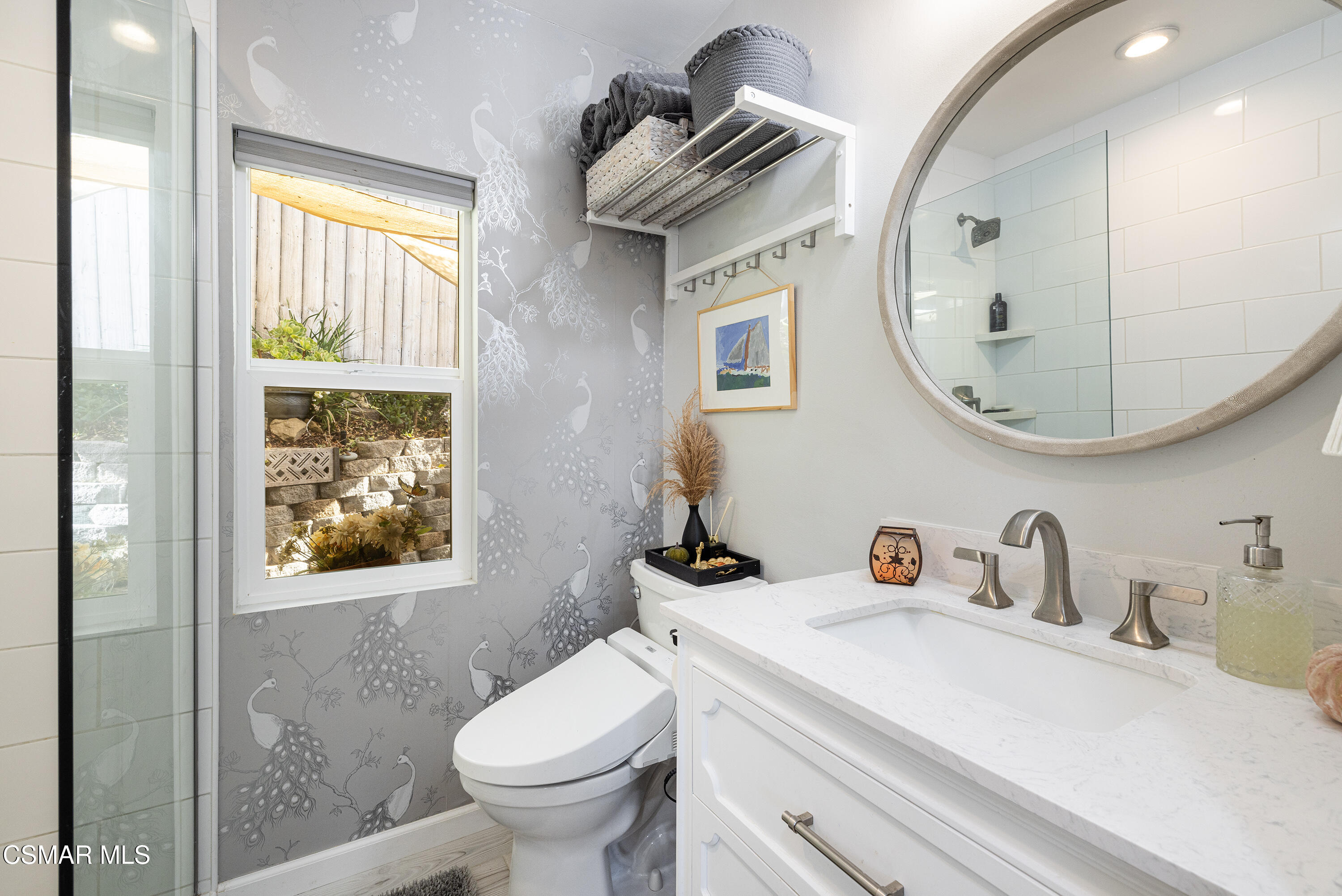 6311 Alta Vista Road Simi Valley, CA 93063 - Photo 19 of 42 a bathroom with a sink a toilet and a mirror