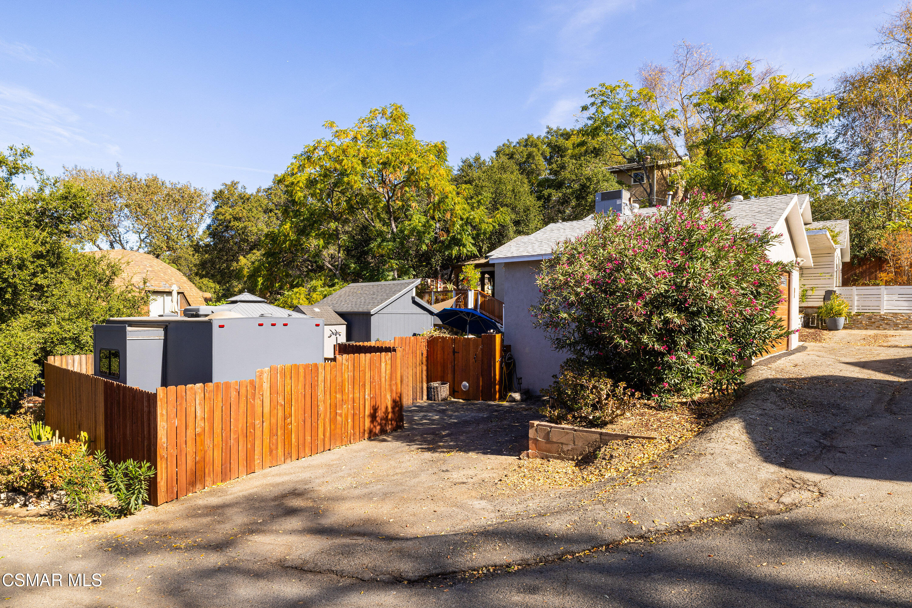 6311 Alta Vista Road Simi Valley, CA 93063 - Photo 2 of 42 a view of a house with a yard covered in snow