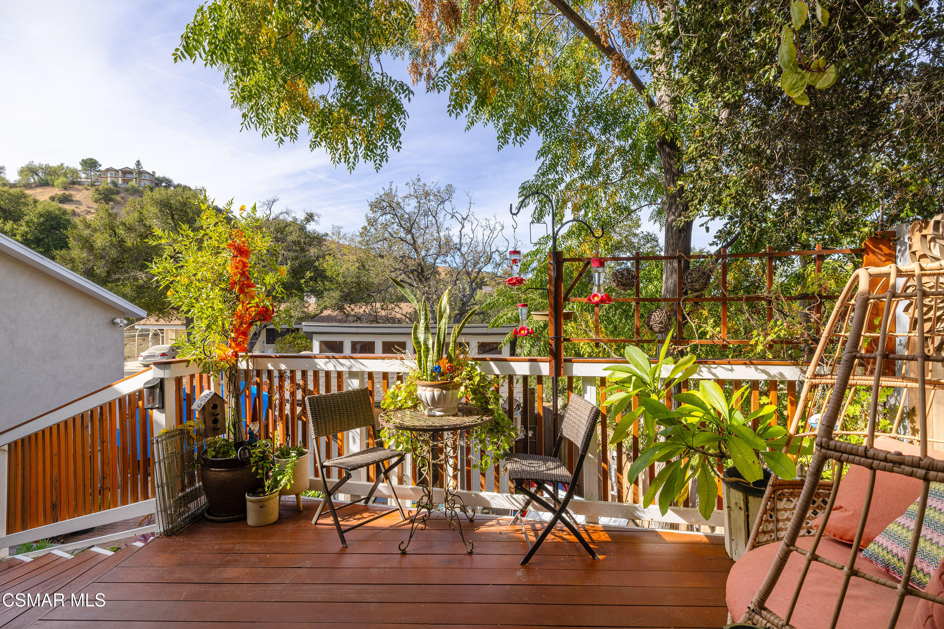 6311 Alta Vista Road Simi Valley, CA 93063 - Photo 24 of 42 a view of balcony with wooden floor and outdoor seating