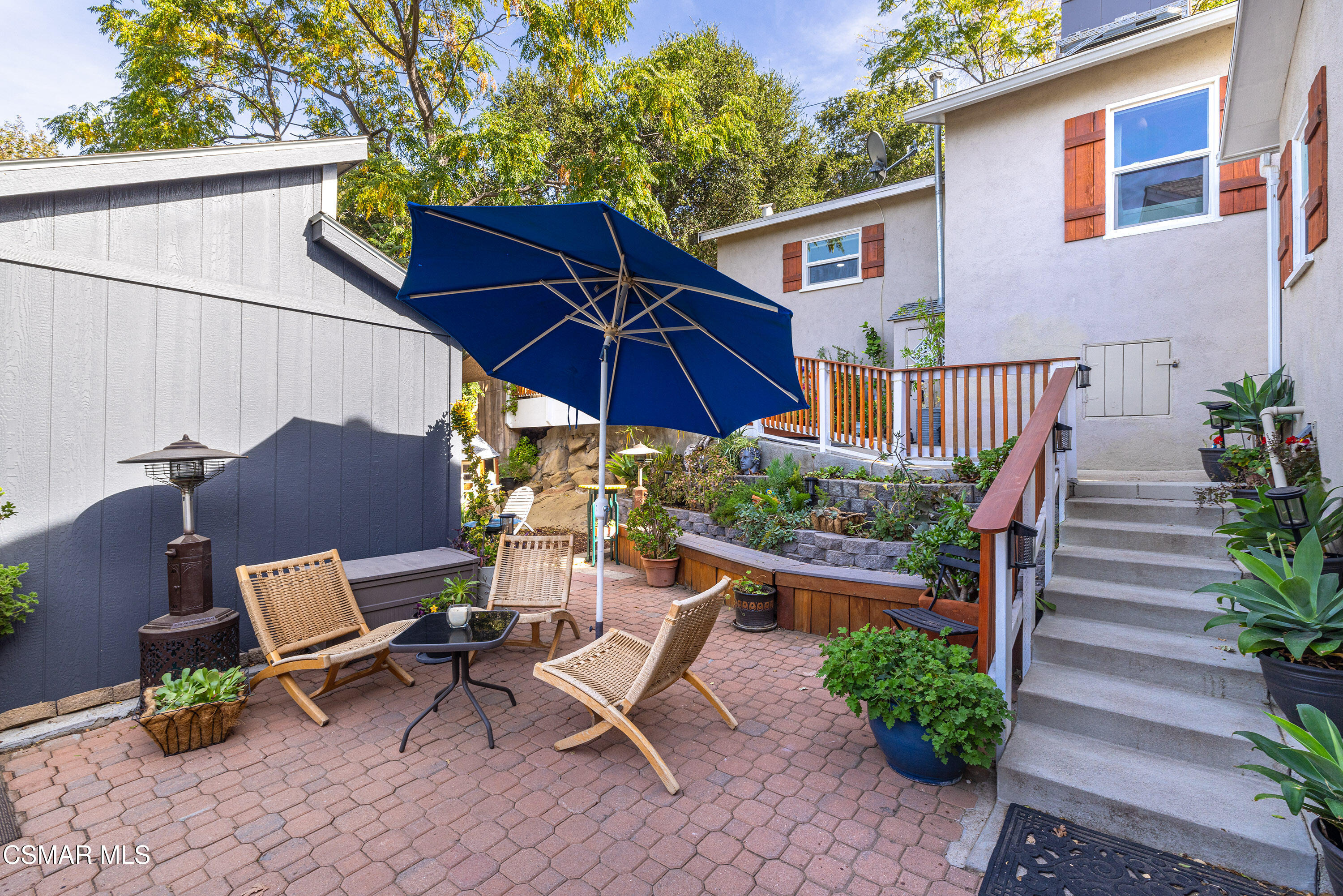 6311 Alta Vista Road Simi Valley, CA 93063 - Photo 29 of 42 a view of backyard with outdoor seating and plants