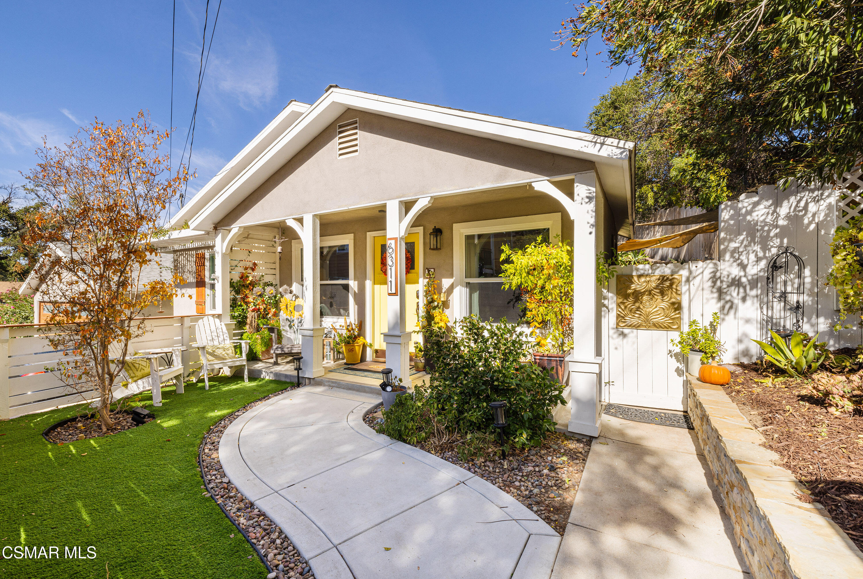 6311 Alta Vista Road Simi Valley, CA 93063 - Photo 3 of 42 a front view of a house with garden