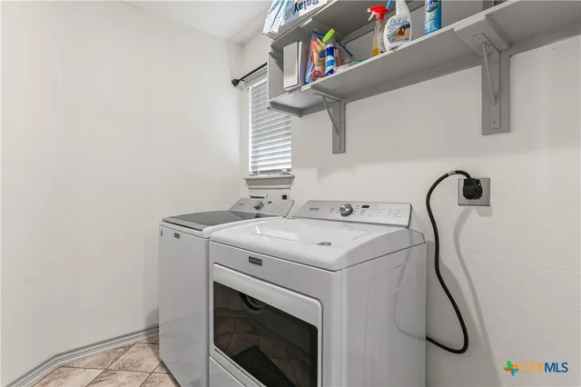 a bathroom with a bathtub and a sink