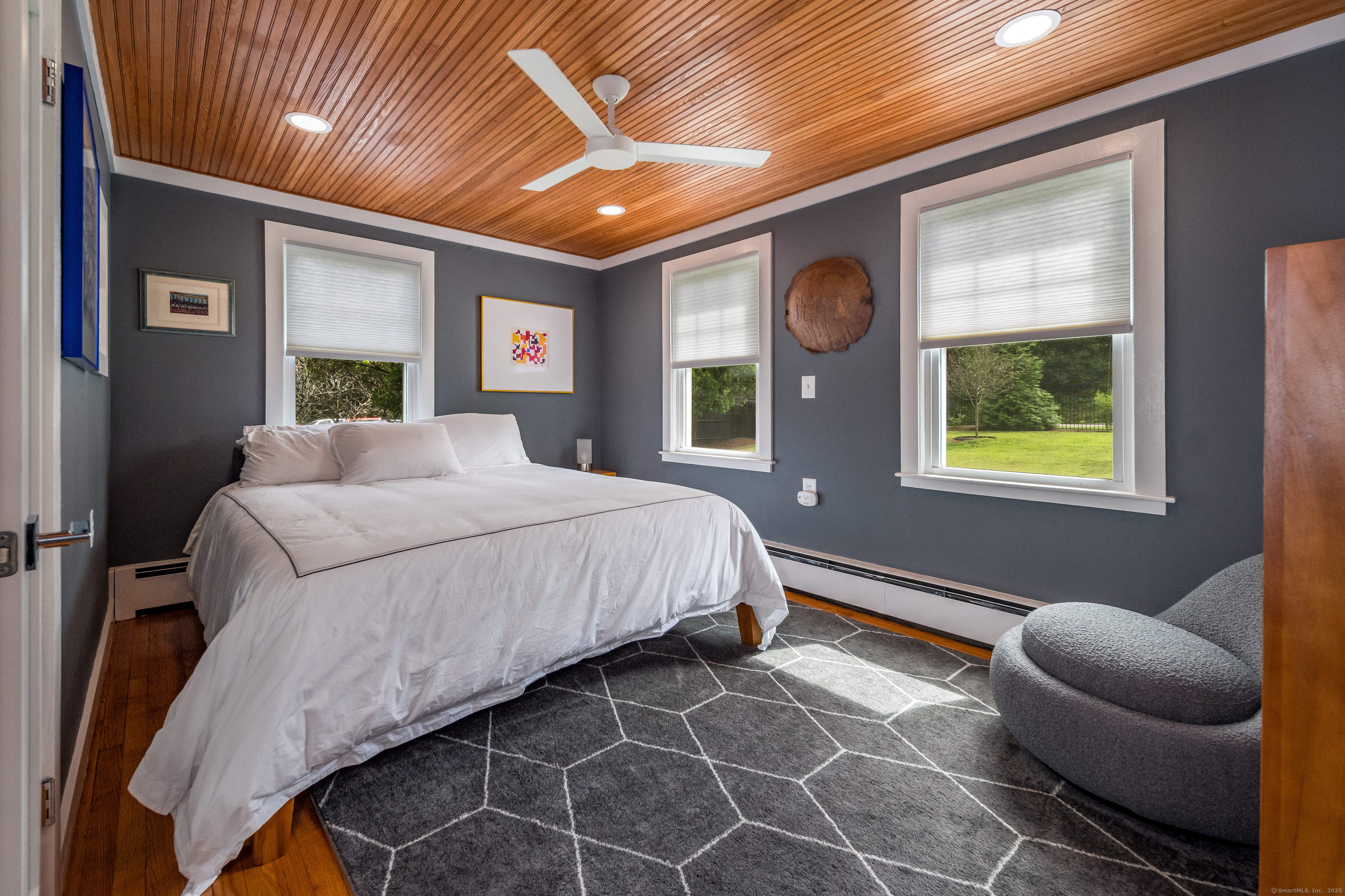 55 Bogel Road East Haddam, CT 06423 - Photo 11 of 39 a bedroom with furniture and a large window