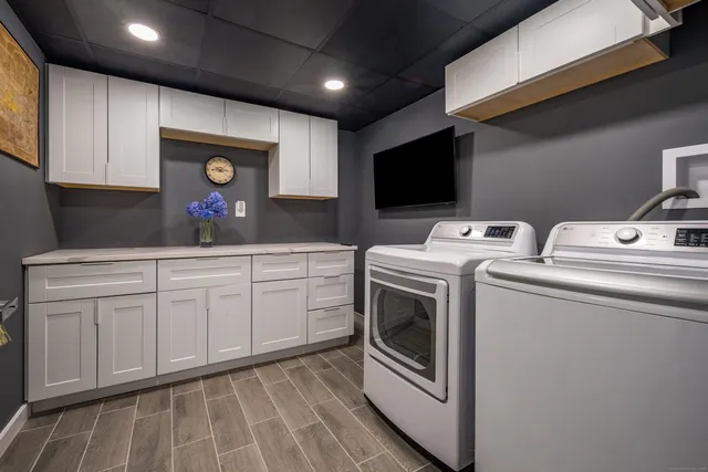 a utility room with dryer and washer