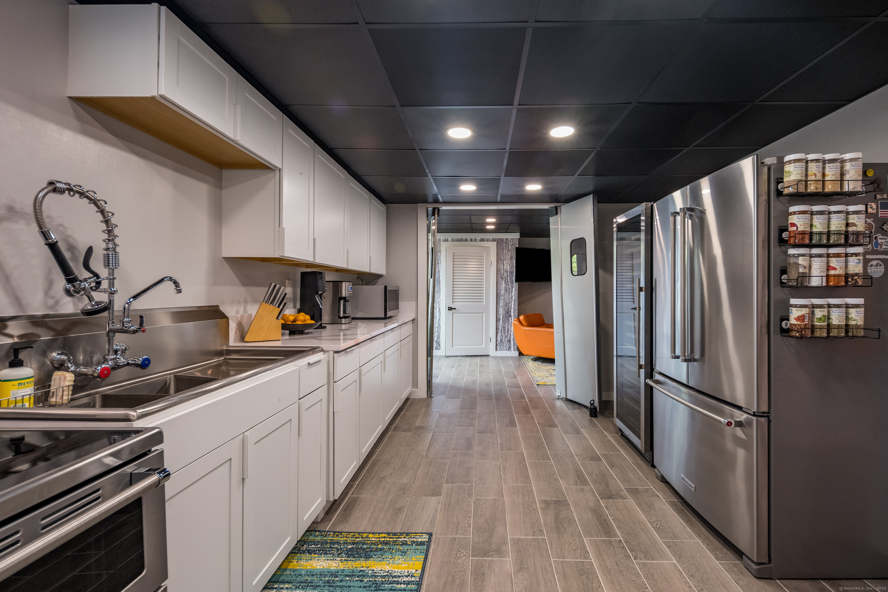55 Bogel Road East Haddam, CT 06423 - Photo 21 of 39 a kitchen with stainless steel appliances a refrigerator a sink a stove and cabinets