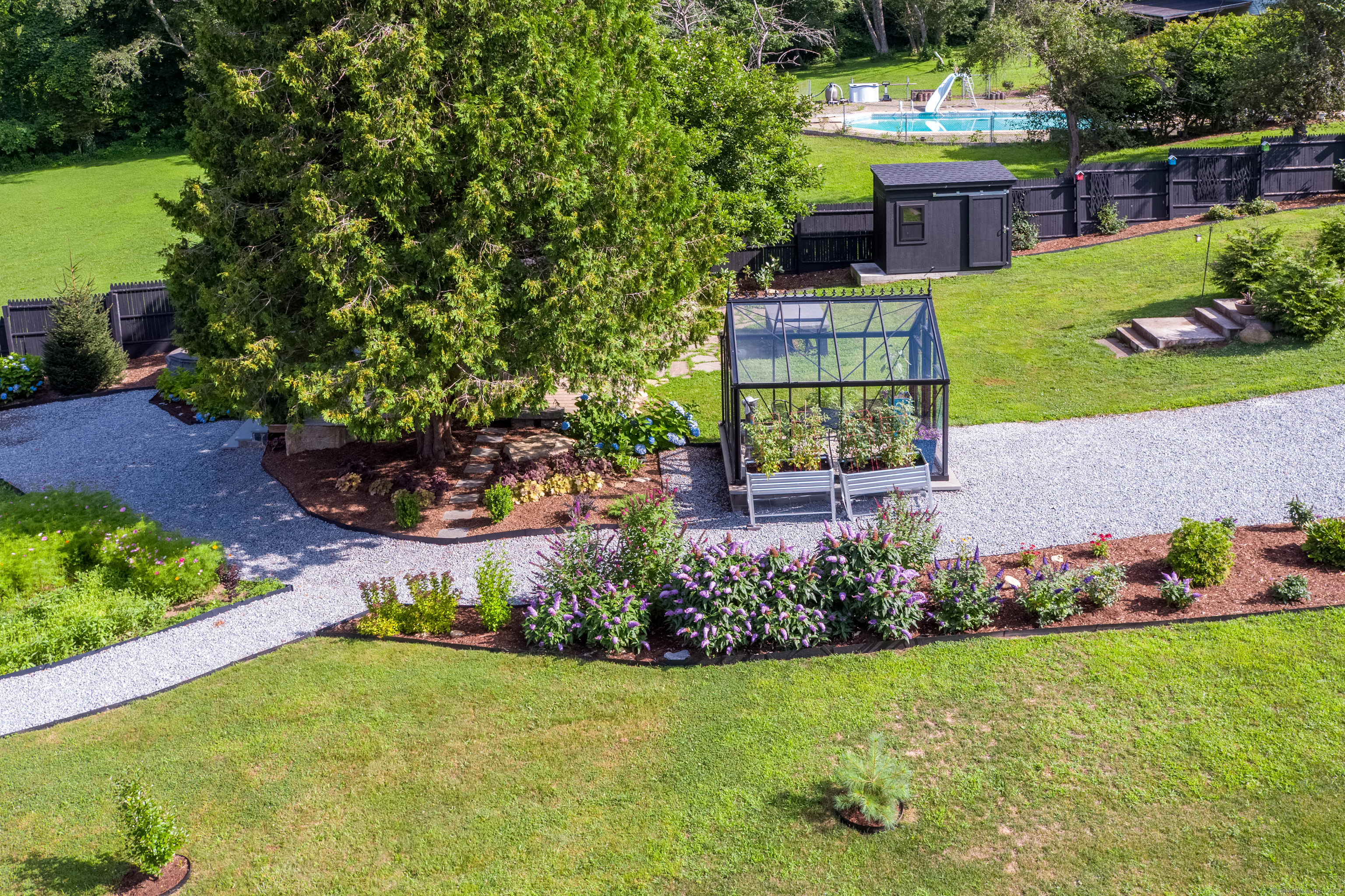 55 Bogel Road East Haddam, CT 06423 - Photo 25 of 39 a view of a house with a garden and yard