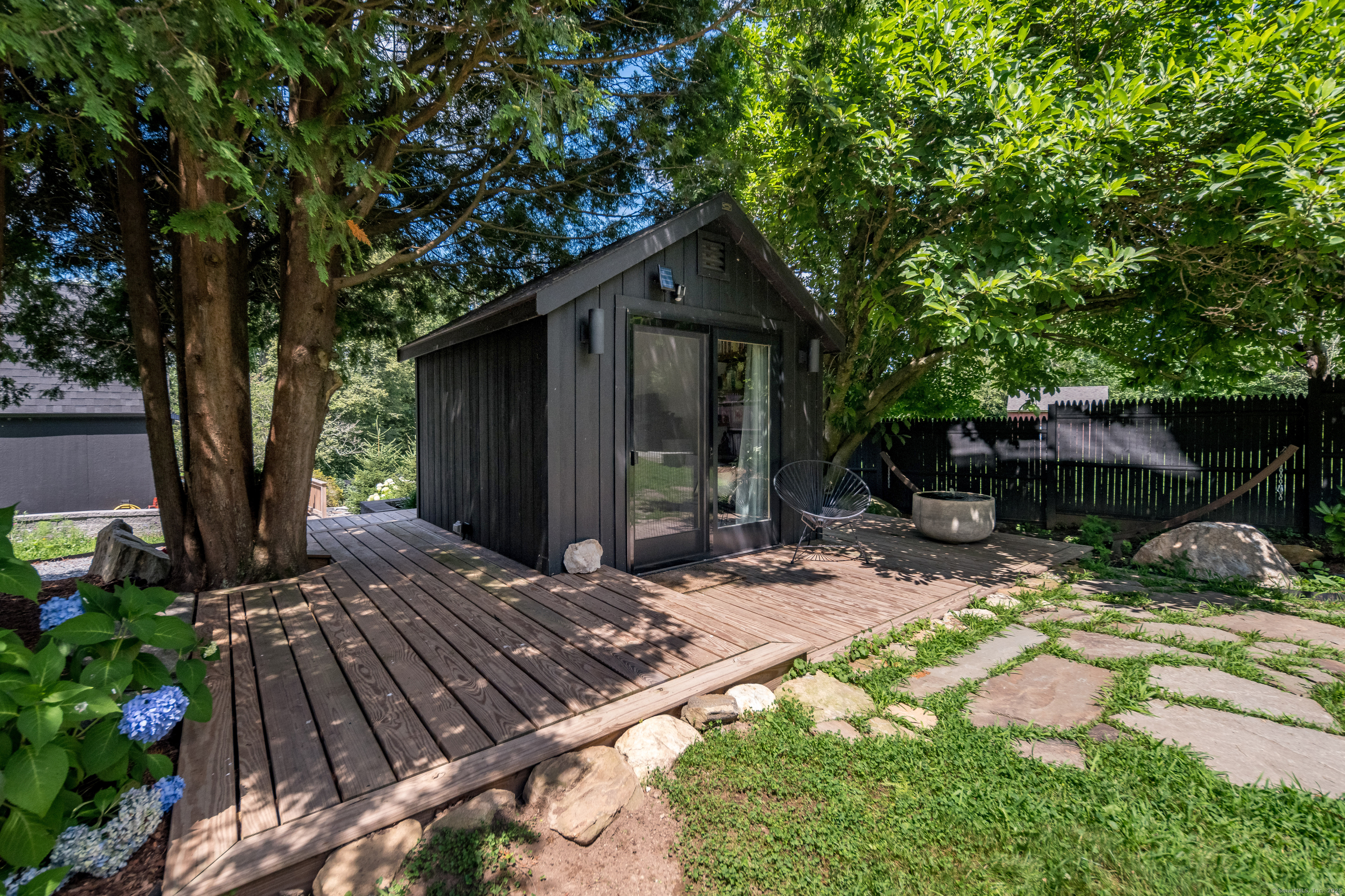 55 Bogel Road East Haddam, CT 06423 - Photo 26 of 39 a backyard of a house with seating space