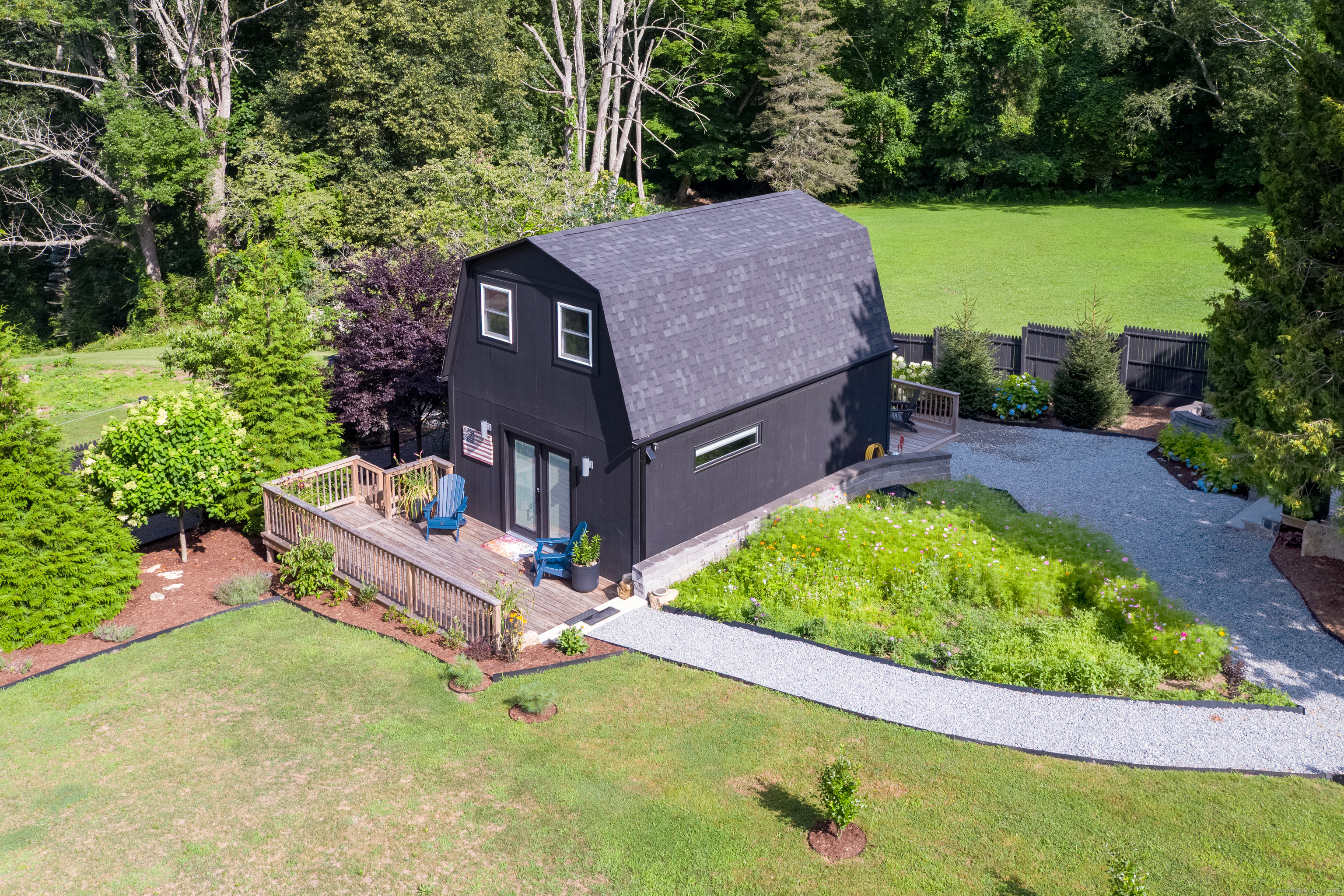 55 Bogel Road East Haddam, CT 06423 - Photo 28 of 39 an aerial view of a house with a garden and large trees