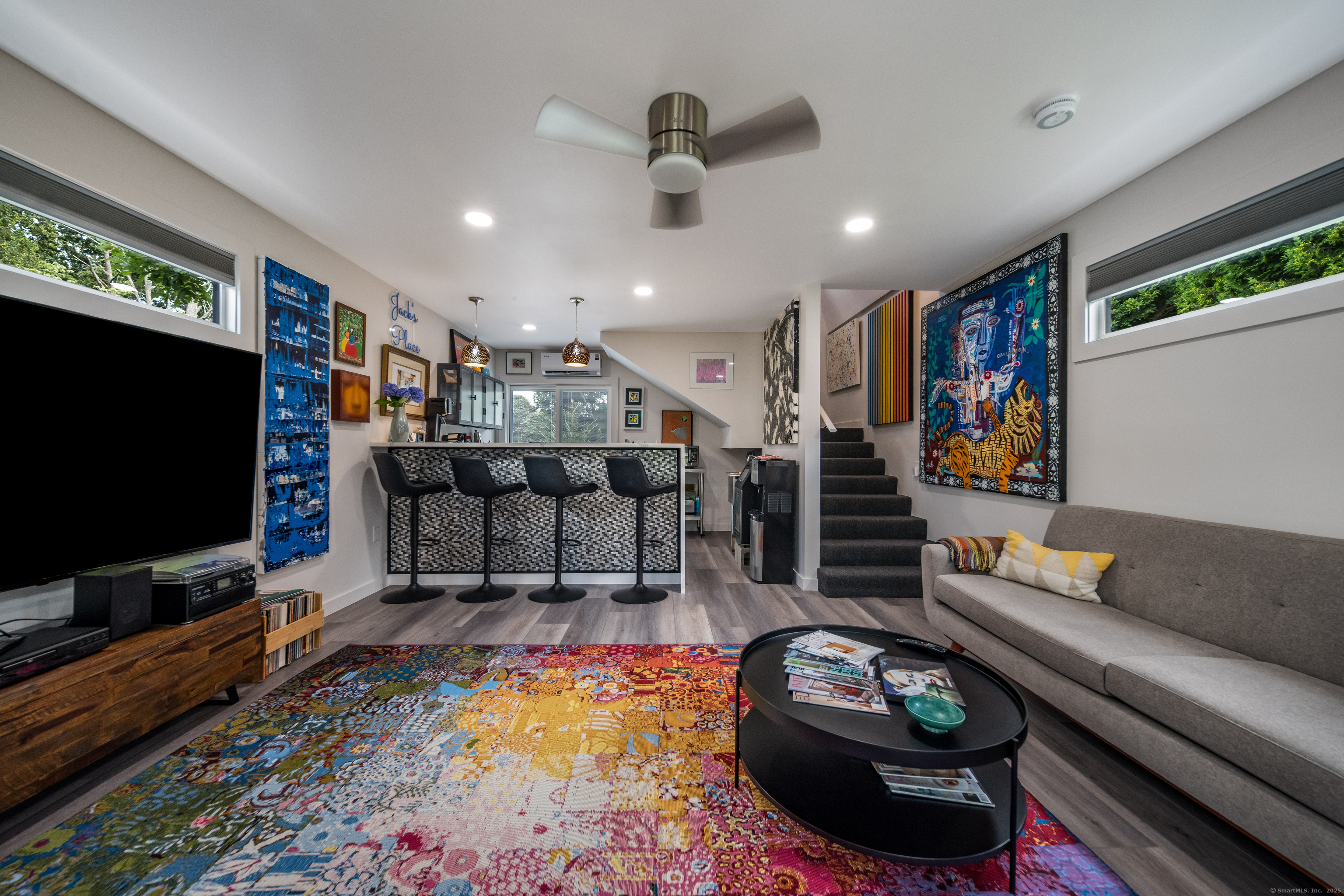 55 Bogel Road East Haddam, CT 06423 - Photo 29 of 39 a living room with furniture and a flat screen tv