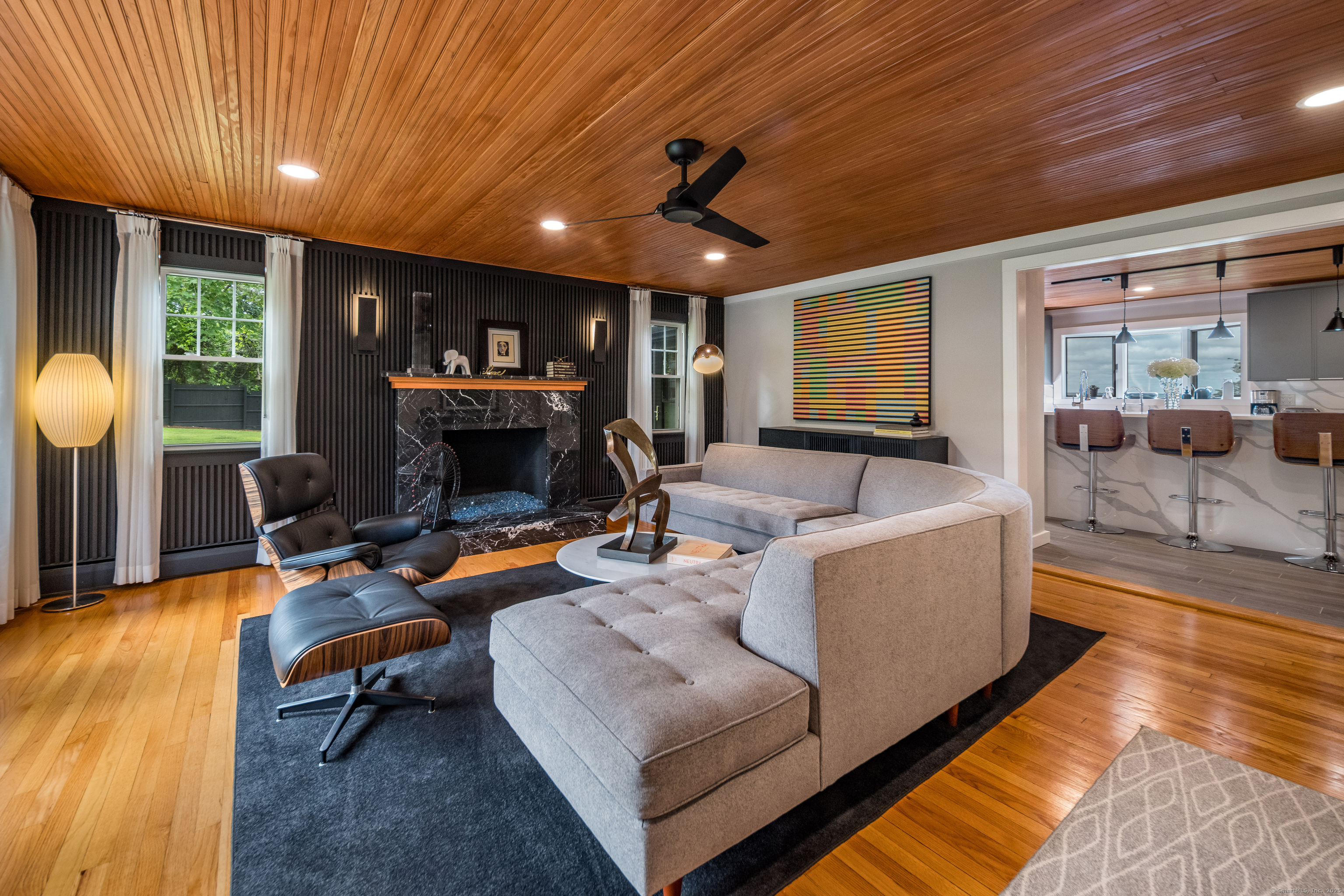 55 Bogel Road East Haddam, CT 06423 - Photo 4 of 39 a living room with furniture and a fireplace